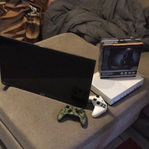 Xbox 1 s A 24 inch TV two controllers and headset